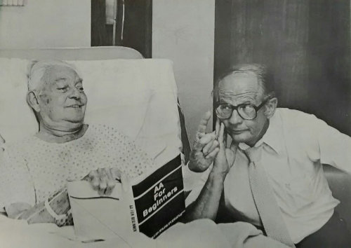Clancy and Chuck C. at hospital bed 1983